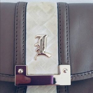 L.A.M.B leather and suede clutch